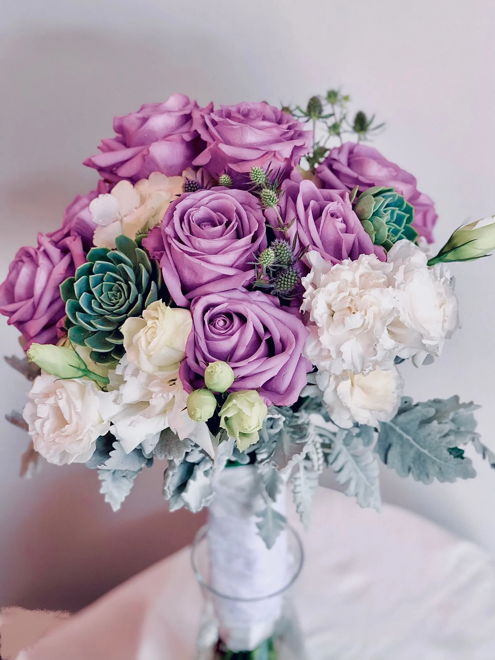 Elegant purple rose bridal bouquet